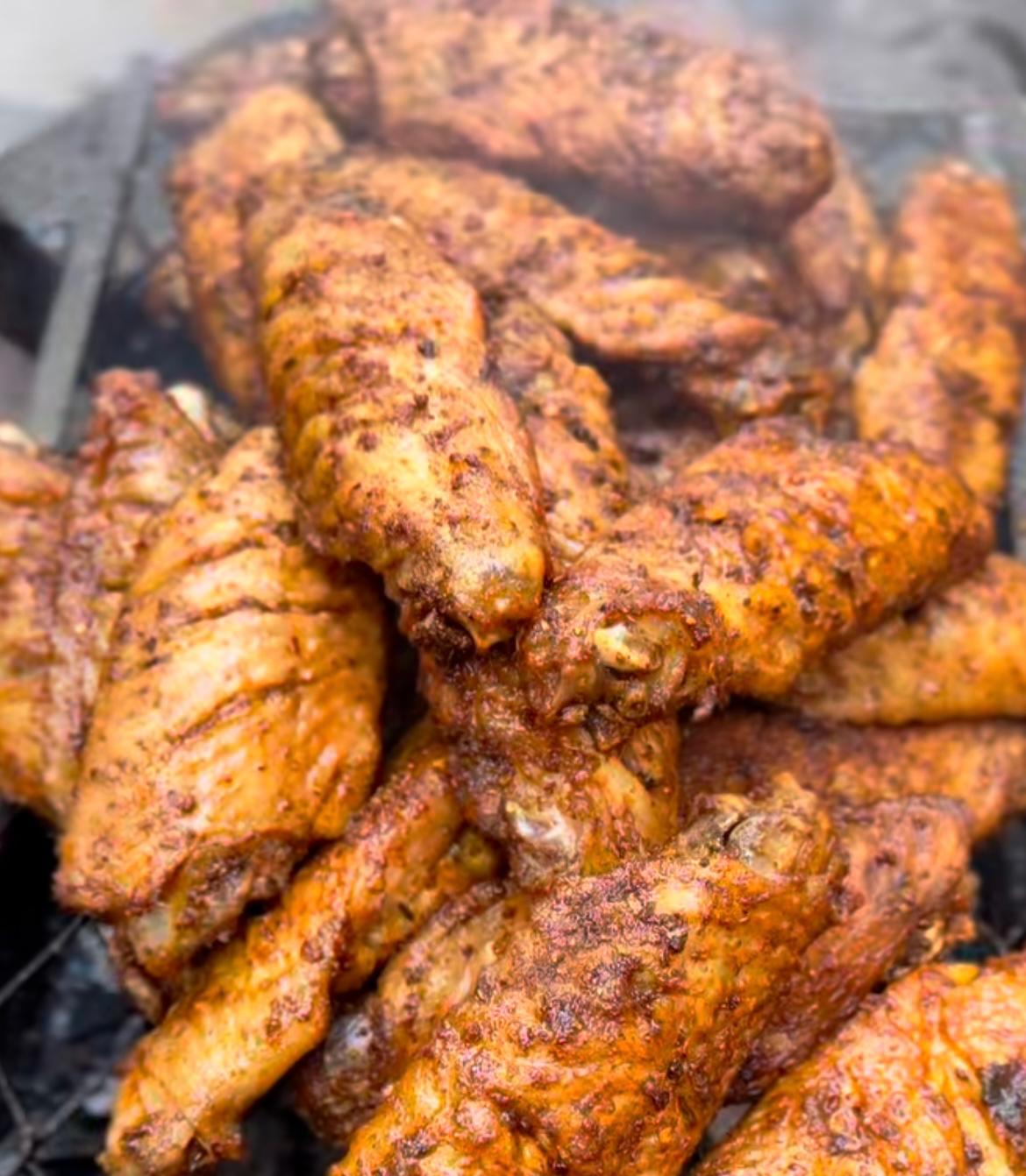 Smoky charcoal-grilled wings with East African spice blend