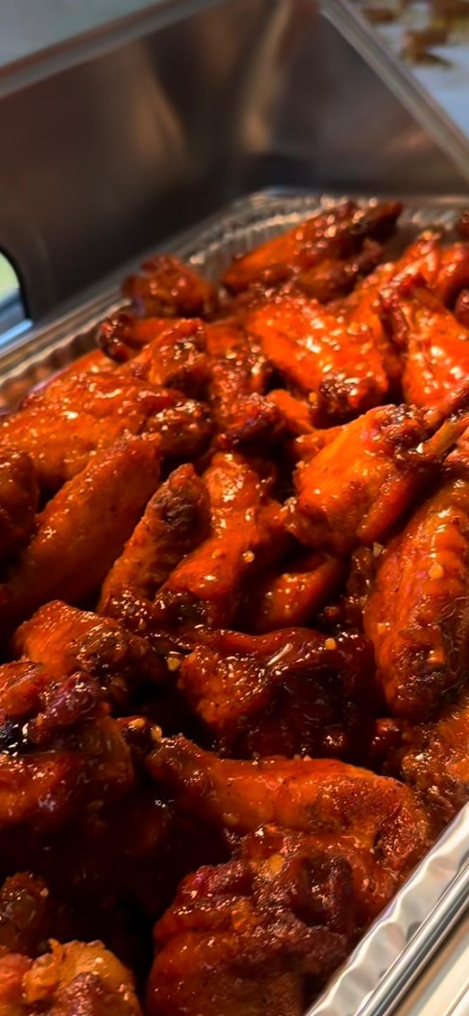 Juicy wings tossed in house honey barbecue glaze with a gentle kick of heat